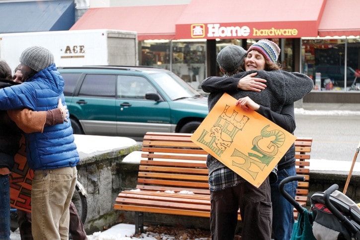 Erin O'Hagan gives out free hugs on Baker Street recently. Samuel Dobrin photo