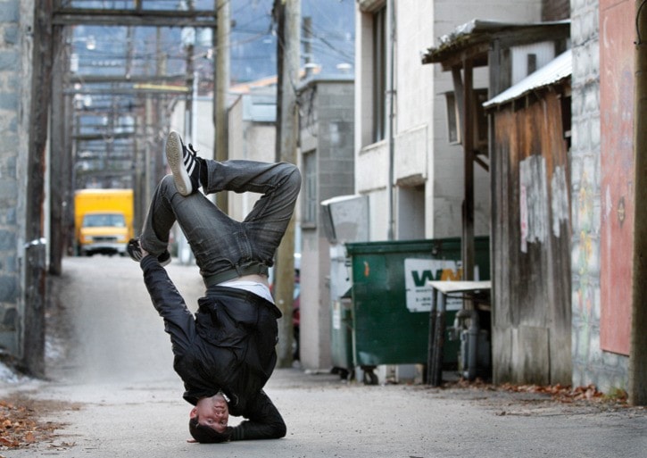 Mike Gardiner does a breakdance stall in a Nelson alley. Samuel Dobrin photo