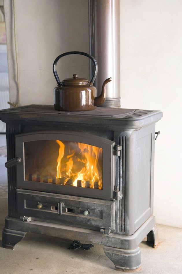 Wood-burning stove with tea kettle