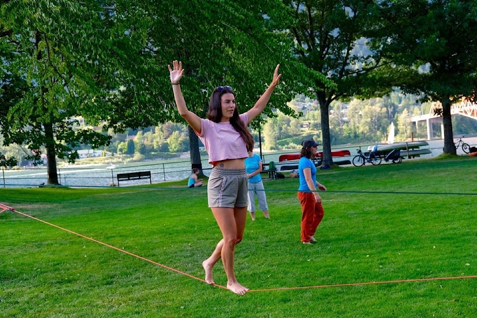 Laurie Coti on a slackline at Lakeside Park in Nelson. “It’s very relaxing. You think about nothing.” Photo: Bill Metcalfe