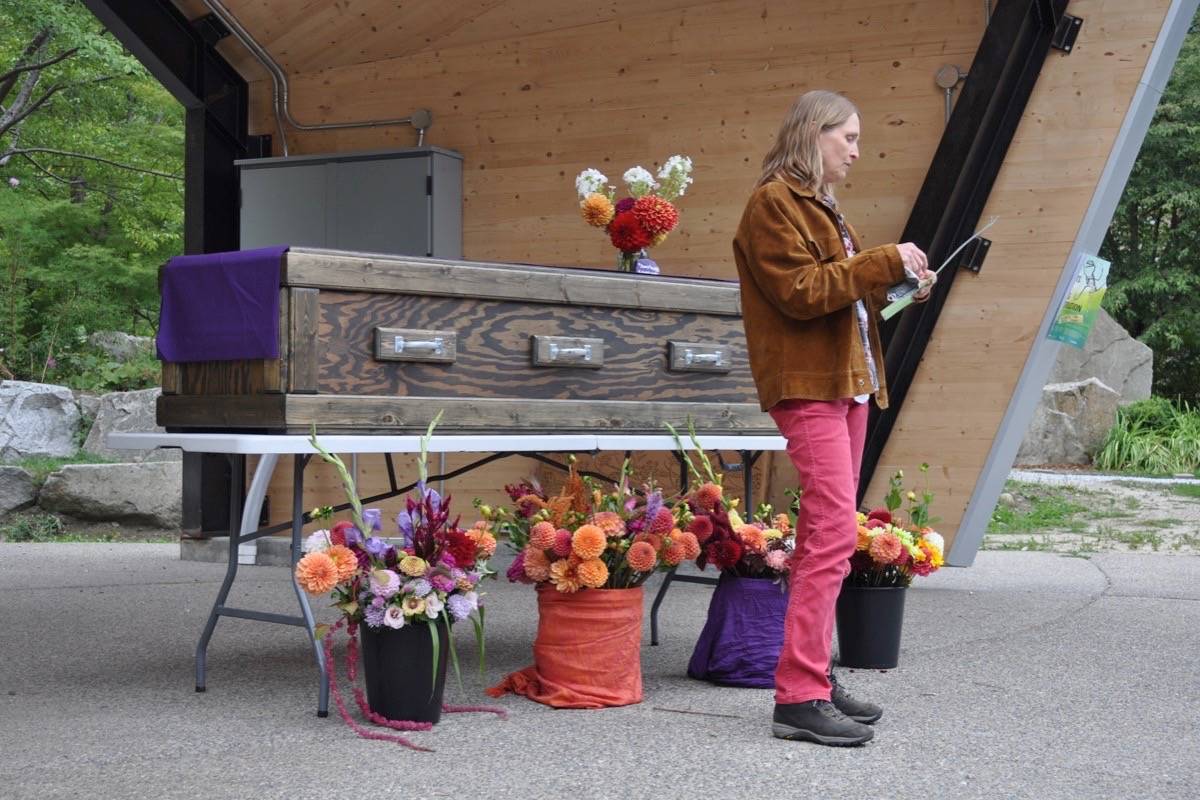 Marty Sutmoller reads a poem in the memory of Sebastian Witt, who died of fentanyl poisoning in 2015. Photo: Tyler Harper
