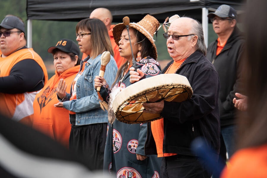 Stz’uminus elder George Harris sang the nation’s anthem and shared the story behind it at an event for National Day for Truth and Reconciliation on Sept. 30. at Transfer beach. (Photo by Tyler Hay)