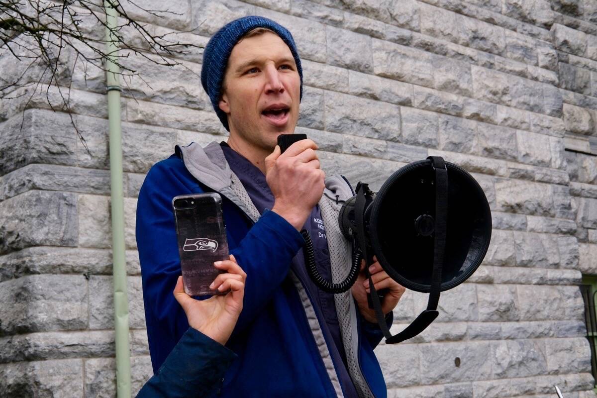 Dr. Kyle Merritt, general practitioner and head of the emergency ward at Kootenay Lake Hospital, speaking to a gathering of the group Doctors and Nurses for Planetary Health in front of Nelson city hall on Nov. 4. Photo: Bill Metcalfe