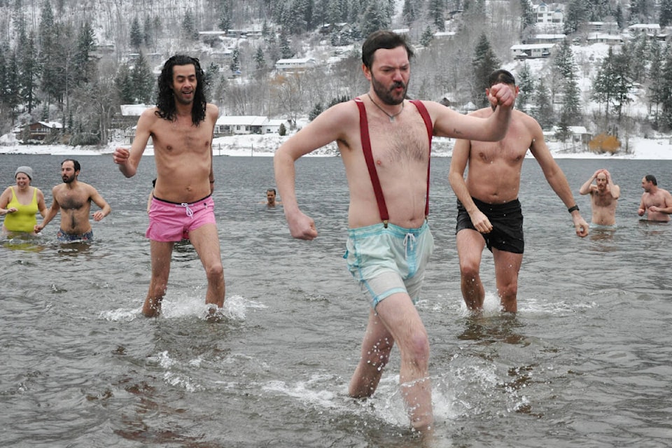 That’s no hot tub. Nelson residents splashed into Kootenay Lake on Sunday for the annual Polar Bear Swim. Photos: Tyler Harper