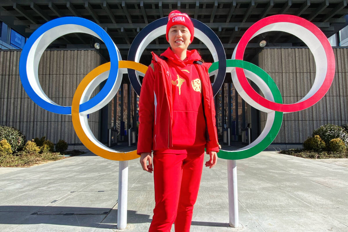 Kimberly Newell poses at the Olympic Village in Beijing. Newell took an unlikely road to becoming an Olympic athlete. Photo: Submitted