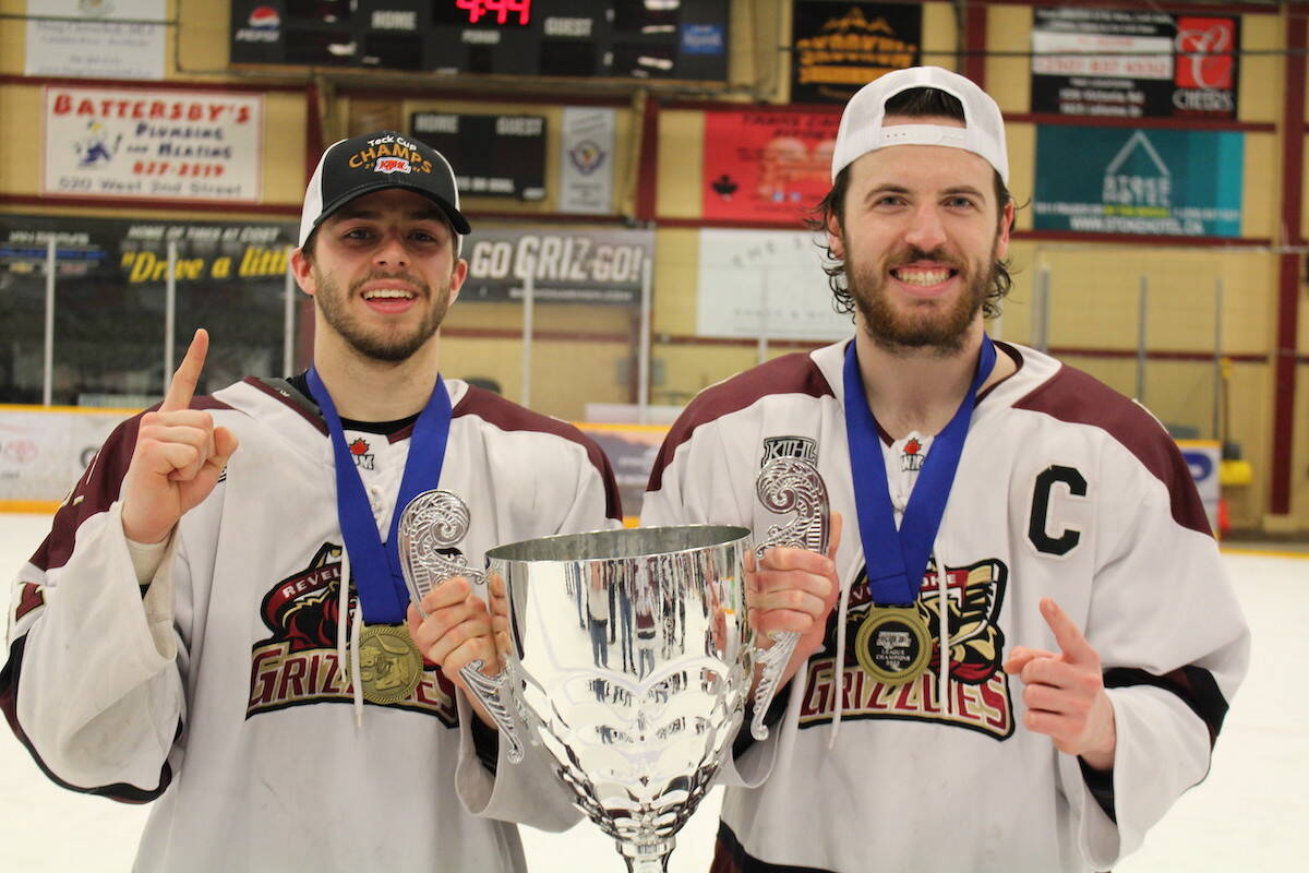 The Grizzlies senior players, Brandon Kasdorf and Cole Berg, with the Teck Cup. (Josh Piercey/Revelstoke Review)