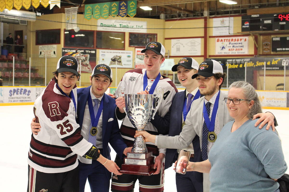 Kurtis Kinoshita, Ethan Mattern, Owen Chamberland, Fraser OBrien, Gage Lajeunesse alongside family holding the cup. (Josh Piercey/Revelstoke Review)
