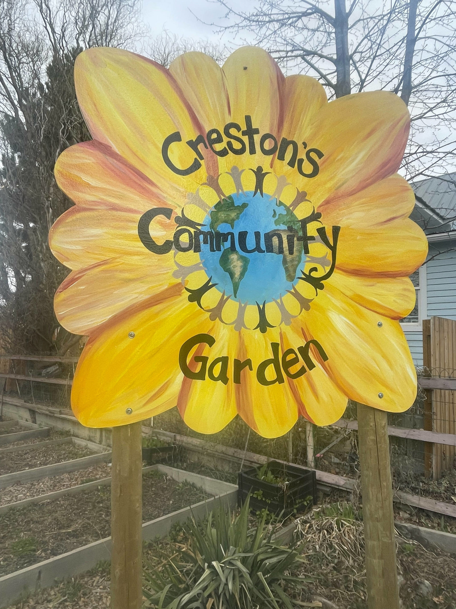 The new Community Garden sign. (Photo by Kelsey Yates)