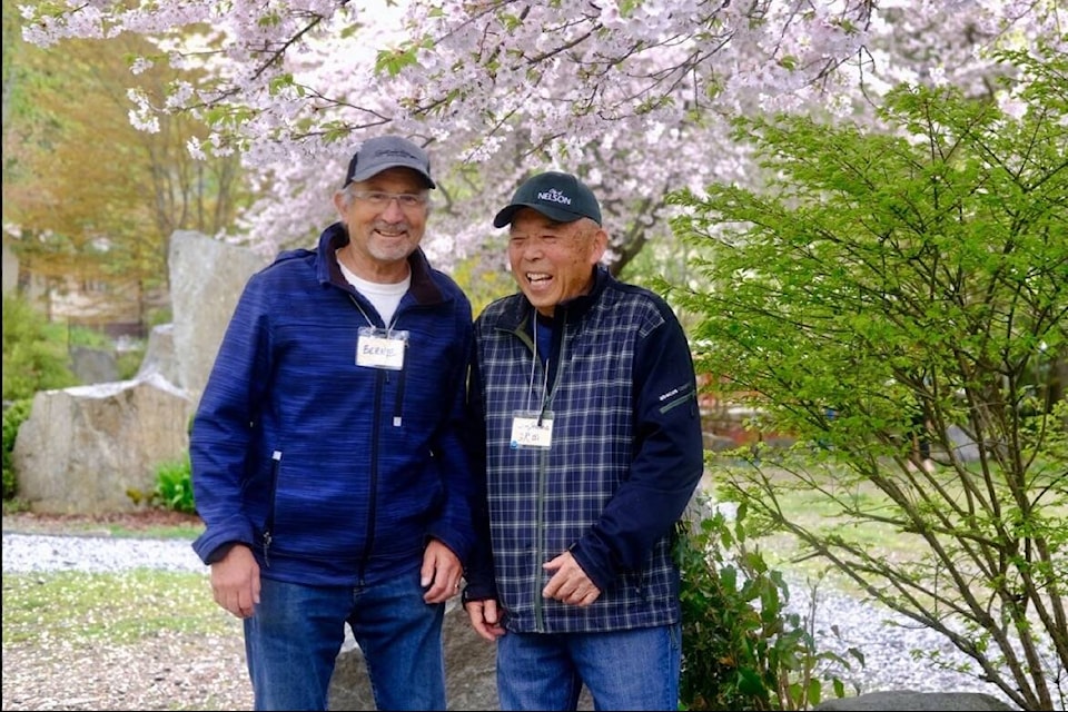 Jim Sawada, right, has recently handed off his job as head gardener at the Friendship Garden to Bernie Zimmer. Photo: Bill Metcalfe
