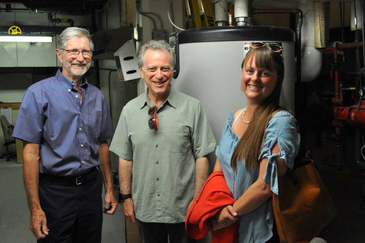 L-R: Nelson Mayor John Dooley, Environment Minister George Heyman and Nelson-Creston MLA Brittny Anderson tour the antiquated furnace room of the Civic Centre. Work aimed at cutting down the buildings greenhouse gasses will begin in 2023. Photo: Tyler Harper