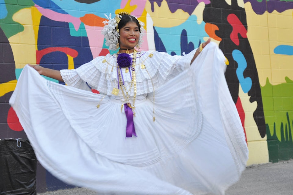 Tania Gaitan performs a Panamanian dance Friday during the Nelson International Mural Festival. Photo: Tyler Harper