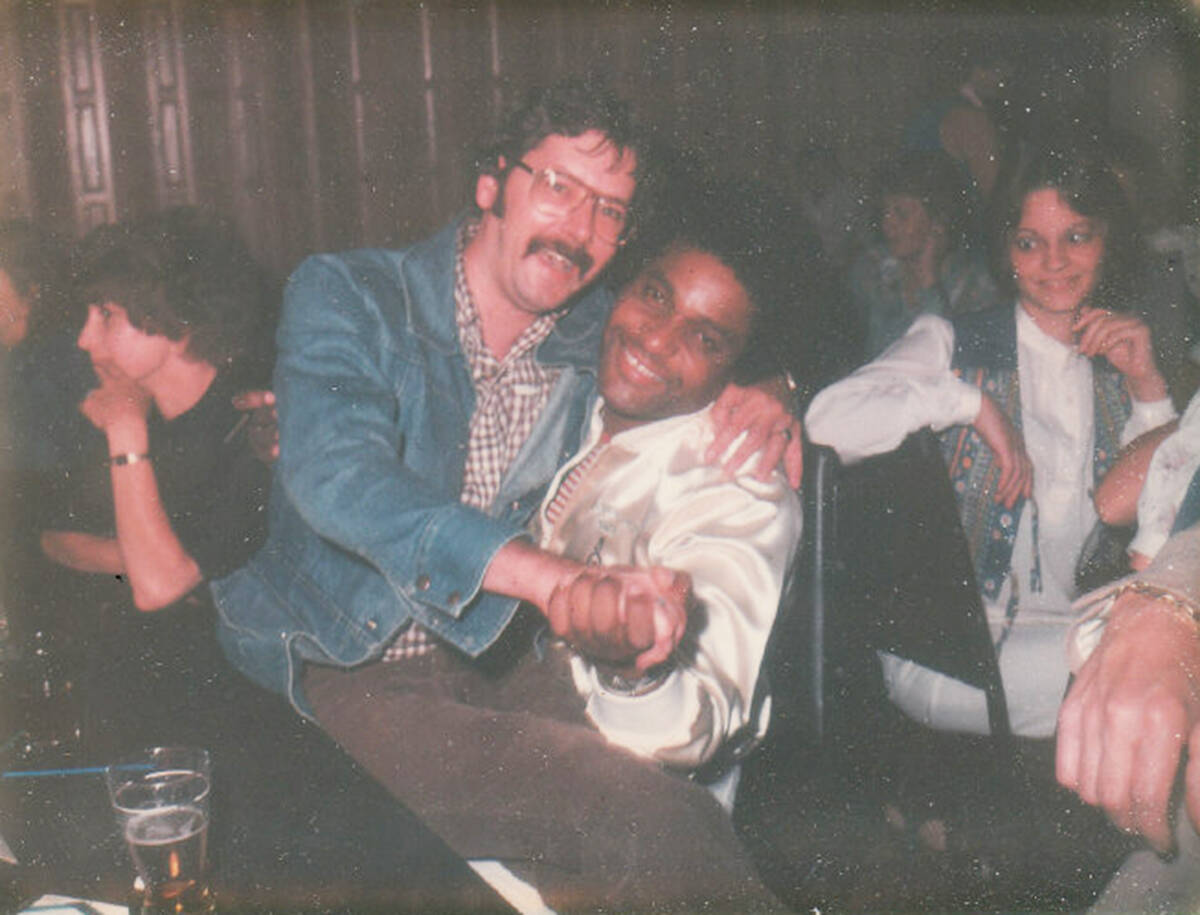 American country music artist Charley Pride (right), with RCA Records promo man Ray Ramsay seated on him and sharing a laugh, at the Newton Inn bar in the late-1970s. (Photo courtesy Ray Ramsay)