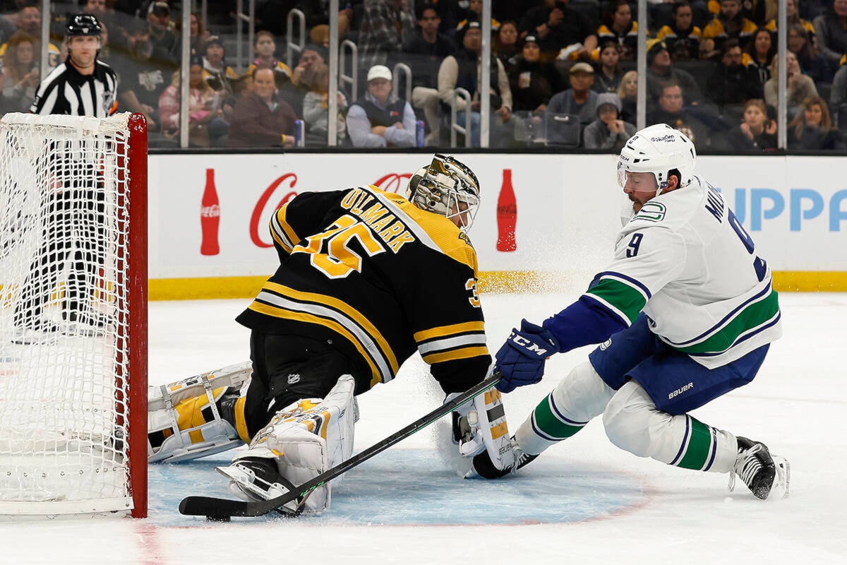 Canucks' Bear leaves game after being hit in the face with puck