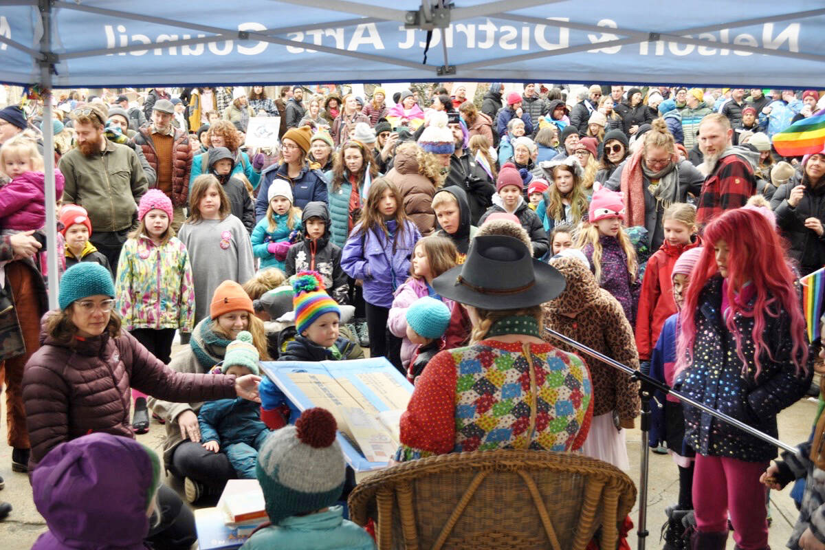 Crowds of parents, children and supporters gathered for stories at a drag reading in front of Nelson City Hall on Saturday. Photo: Tyler Harper