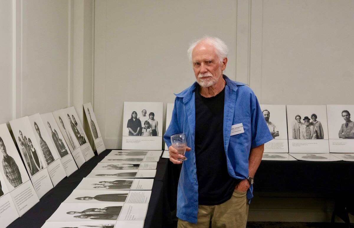 Former instructor Jeremy Addington at the DTUC reunion with his exhibit of photos of student and faculty after the closing of the school in 1984. Photo: Bill Metcalfe