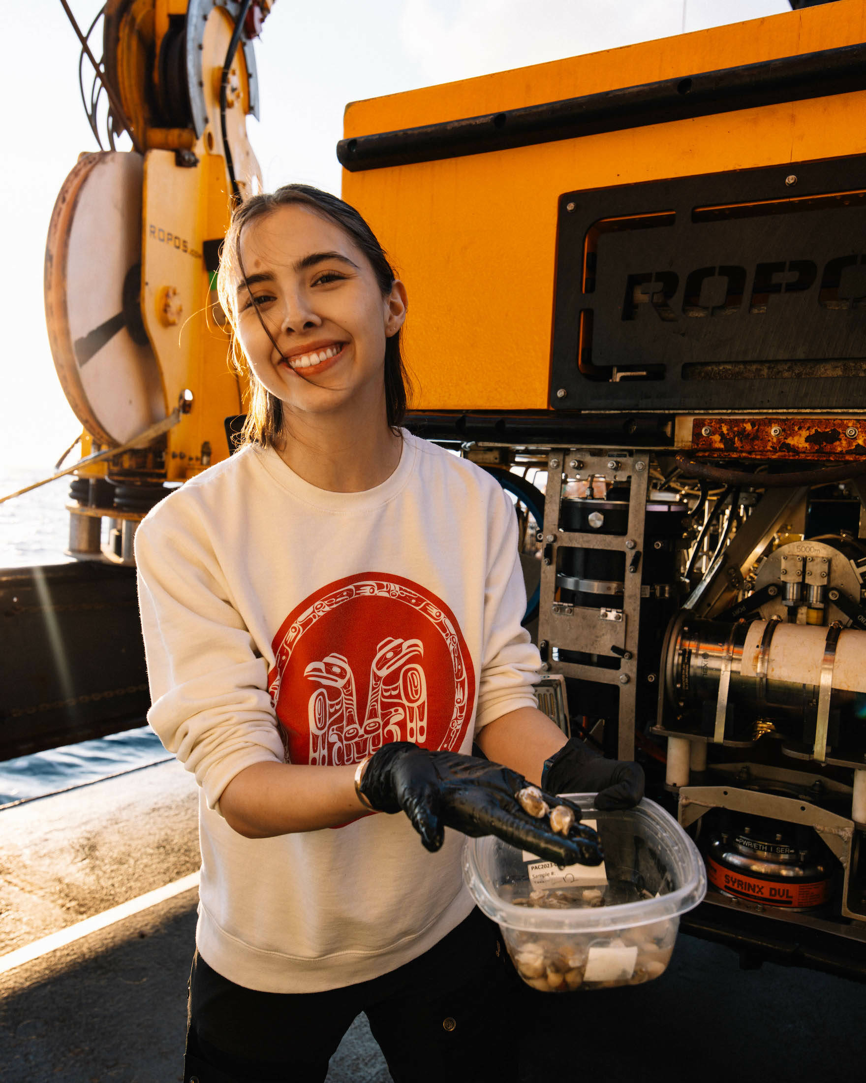 Rayne Boyco, a marine planner with the Haida Nation, aboard the expedition to the proposed Tang. gwan-hacxwiqak-Tsigis Marine Protection Area. (Nicole Holman/Fisheries and Oceans Canada)