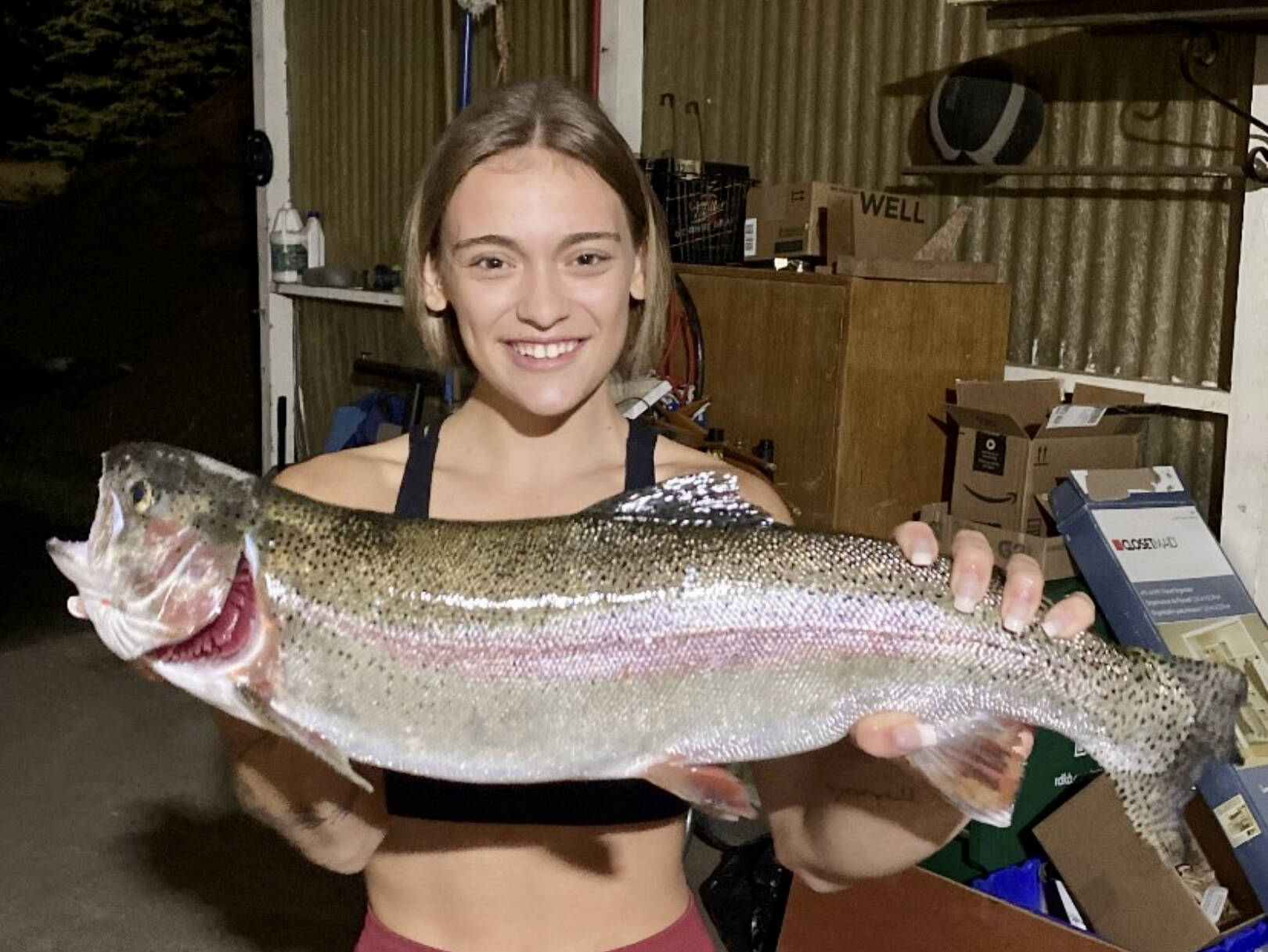 Teenager tussles with huge trout from Trail rivershore - Nelson Star