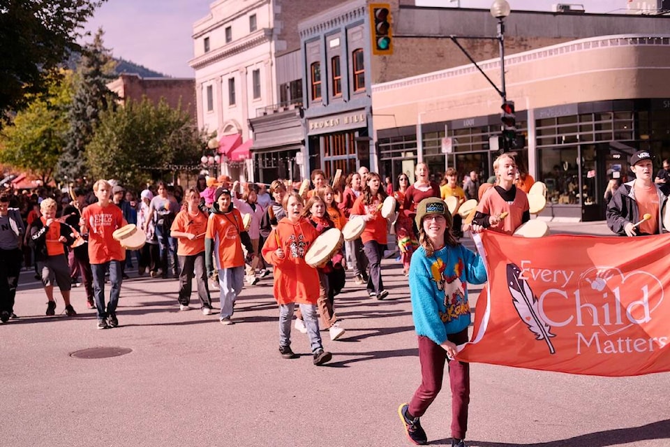 Hundreds of kids marched through Nelson streets Friday to recognize National Day for Truth and Reconciliation. Photo: Bill Metcalfe