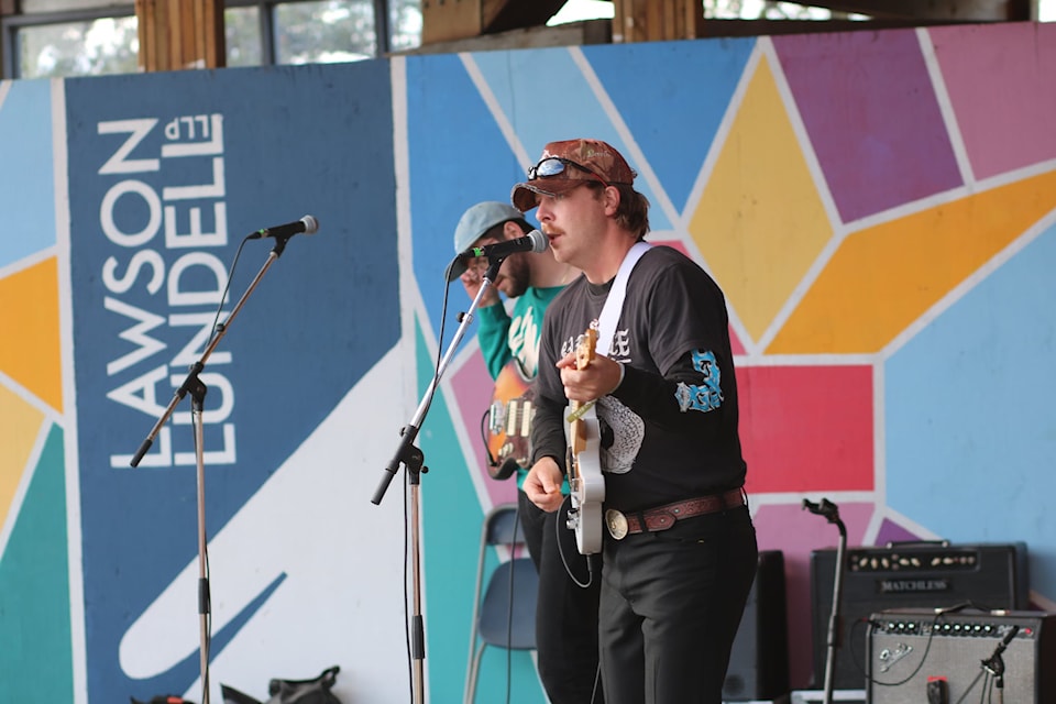 Amos Nadlersmith of Winnipeg's Amos the Kid performs on the main stage.