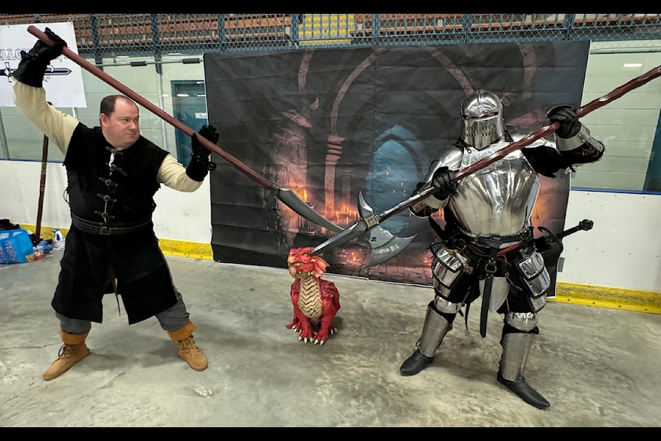 Medieval Chris Bessey spars with a knight in shining armour - Phil Anderson - during a Dungeons and Dragons-like battle during the Ptarmicon 2024 convention held in Yellowknife on the weekend. Jill Westerman/ϳԹ photo