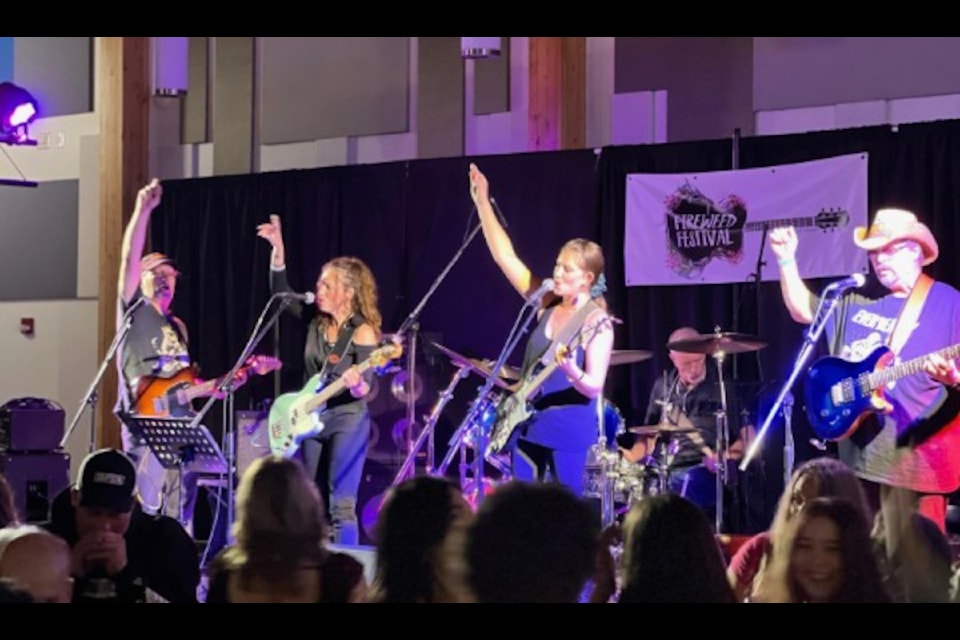The band 5/3 Mad raises their arms during a bridge at the 2024 Fireweed Festival. More than 60 performers will be performing three sets apiece at this year's festival.
Photo courtesy Fireweed Festival