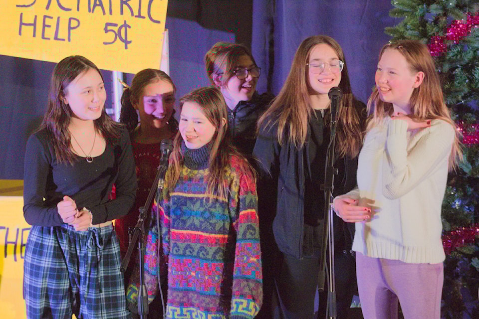 Singing in the New Year — Hanna Robertson, Mackenzie Hicks, Taya Norris, Gracie Adams, Marlo Jenks and Caitlyn Wright sing 'Let it Go' during a Coffee House sing-a-long held over the holidays.