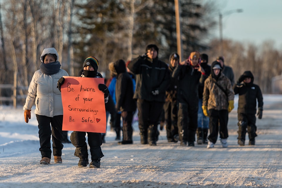 Dozens of community members in Fort Providence came together for an addictions awareness walk on Nov. 25. Photo courtesy of Thorsten Gohl