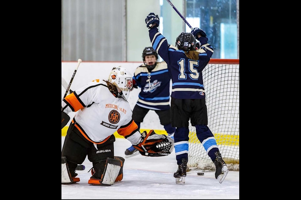 Schuyler Greening (15) celebrates as she scored what would turned out to be the game-winner against the Medicine Hat Wildcats during round-robin play at the Canadian Tire Wickfest Tournament in Calgary on Nov. 30. Photo courtesy of Wickfest