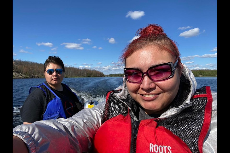 From left, siblings Howie and Crystal Benwell enjoy a boat ride together. Howie was one of six people to perish in a January, 2024 plane crash outside Fort Smith. The incident is still being investigated by the Transportation Safety Board of Canada. Photo courtesy of Crystal Benwell