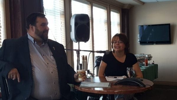 Deputy Minister at the Government of Nunavut's Department of Economic Development and Transportation Sherri Rowe, seated with Iqaluit Chamber of Commerce president Matthew Clark, takes questions after speaking about Nunavut's economic status at a chamber breakfast event May 25. Michele LeTourneau/NNSL photo