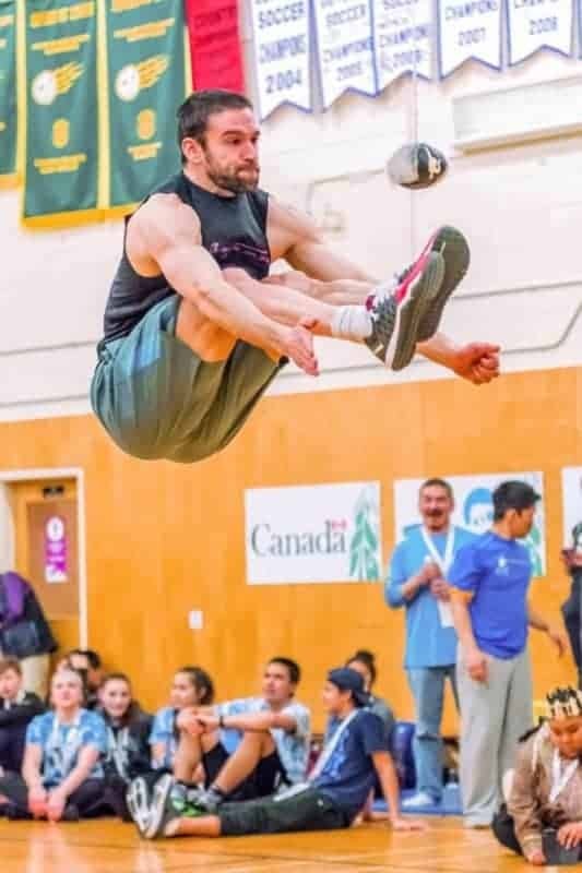 Andrew Bell, of Arviat, performs a two-foot high kick at the 201