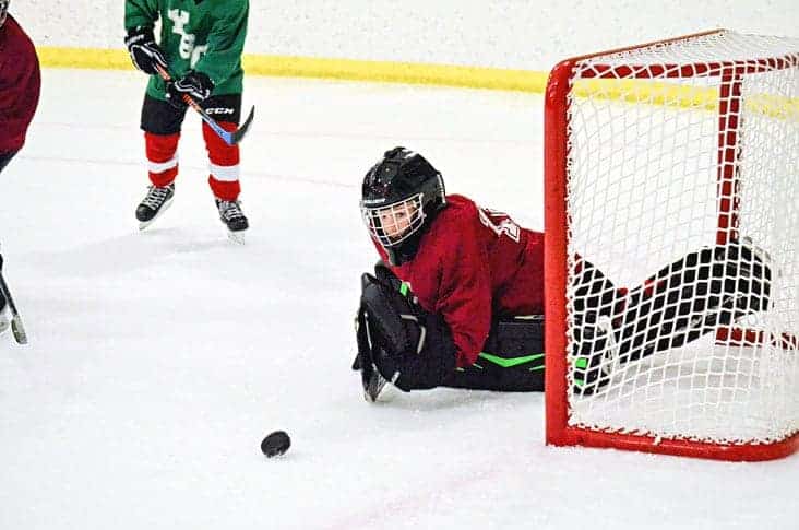 Kaden Hotter watches the puck slide by his net during action in the Yellowknife Sporting Club's three-on-three Spring Hockey League playoffs at the Yk Community Arena in May 2017. The club has been granted an exemption by the Office of the Chief Public Health Officer to begin skills and drills sessions under Phase 2 of the GNWT's Emerging Wisely document. NNSL file photo