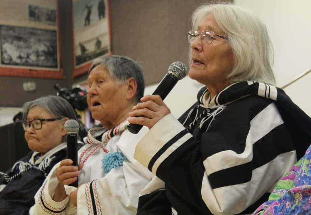 Elders sing a drum song at the opening of the Umiyaqtutt Festival in Gjoa Haven. From left, Mary Aqiliriaq, Alisa Kammimalik and Miriam Aglukkaq. 