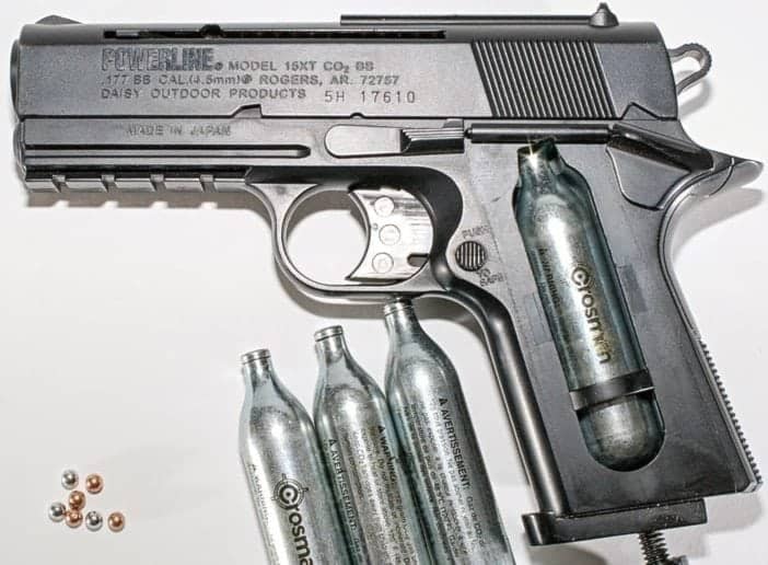 A BB gun with compressed air cartridges and pellets. Hustvedt/Wi