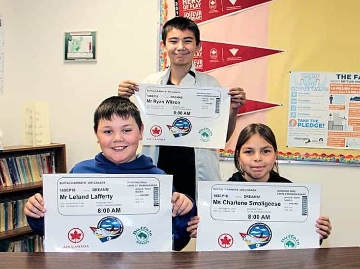 Three students at Princess Alexandra School SA¹ú¼ÊÓ°ÊÓ´«Ã½“ left to right, Leland Lafferty, Ryan Wilson and Charlene Smallgeese SA¹ú¼ÊÓ°ÊÓ´«Ã½“ were surprised on Sept. 14 by being selected for a trip to Disneyland. Paul Bickford/NNSL photo.