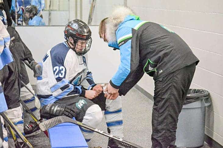 Logan Cunningham, seen getting some repairs done during the 2018 Arctic Winter Games in Hay River this past March, is part of the Yukon Rivermen bantam AAA hockey, a joint effort between Hockey NWT and Hockey Yukon. NNSL file photo.
