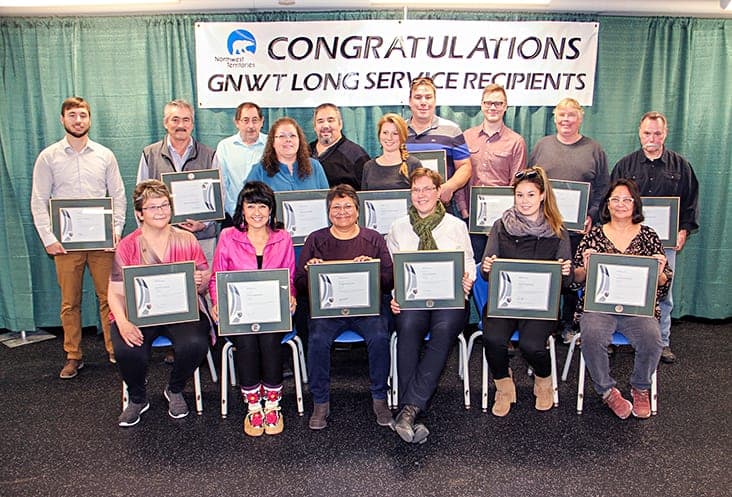 Some of the recipients of the GNWT's long-service awards on Oct. 10 were, front, left to right, Beatrice Oslund, Cheryl Melanson, Margaret Jerome, Diane Chisholm, Raelene Lamalice and Laverne Cameron; and, back, left to right, Brent Townend, Ronald Bonnetrouge, Andrew Butler, Maxine Gauthier, David Sanquez, Kathleen Groenewegen, Ken Boyer, Tyler Rea, Robert Larson and Bradley Boudreau. Paul Bickford/ºÚÁϳԹÏÍø photo.