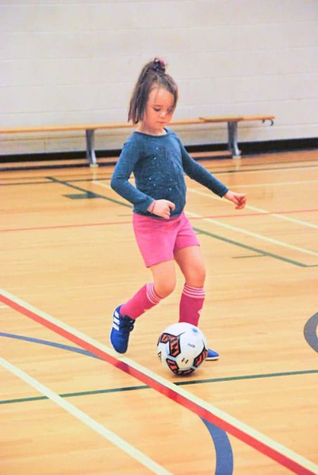Emereigh Moffatt works on her footwork during a drill as part of the NWT Futsal League's opening day at St. Joseph Gymnasium on Sunday. James McCarthy/NNSL photo