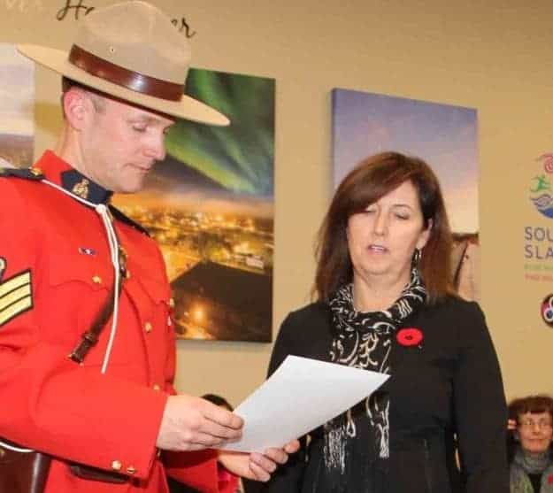Kandis Jameson, right, was sworn in Nov. 6 as the new mayor of the Town of Hay River. Conducting the ceremony was Sgt. Brandon Humbke of the . Paul Bickford/NNSL photo