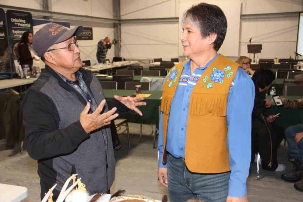Alec Sunrise, left, a former chief of K'athlodeeche First Nation (KFN), chats with Chief Clarence Louie of the Osoyoos Indian Band in British Columbia. Louie was the keynote speaker at the KFN Mining Symposium held in Hay River on Nov. 14 & 15. Paul Bickford/NNSL photo