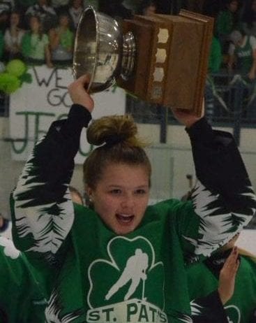 Danae Lafferty of St. Pat's hoists the Wade Hamer Challenge Cup's girls trophy aloft after the Irish defeated Sir John Franklin in the girls game one year ago. NNSL file photo