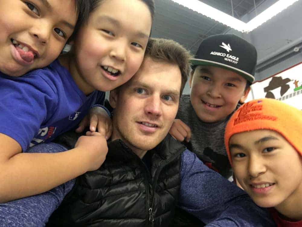 Minor hockey players, from left, Ricky Putumiraqtuq, Brya Kingunkotok, Daniel Kingunkotok and Amos Nakoolak are having a blast hanging-out with head instructor David Clark of Rankin Inlet during the Rankin Rock Season Opener hockey camp in Baker Lake. That camp was followed up last week with another one in Arviat. Photo courtesy David Clark
