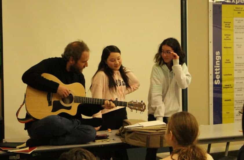 January 11, 2019 Folk singer Craig Cardiff provides instrumentation for grade seven and eight William McDonald Middle School students as they write their own songs about Yellowknife during a song writing workshop. Brett McGarry/NNSL Photo