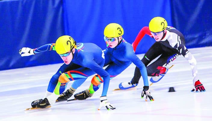 Braeden Picek, left, and Dalton McLeod lead a Yukon skater during the junior boys 1,000-metre speed skating final at the 2018 Arctic Winter Games in Fort Smith. Both Picek and McLeod made the cut for the 2019 Canada Winter Games in Red Deer, Alta., at NWT Speed Skating's selection camp in Yellowknife earlier this month.
