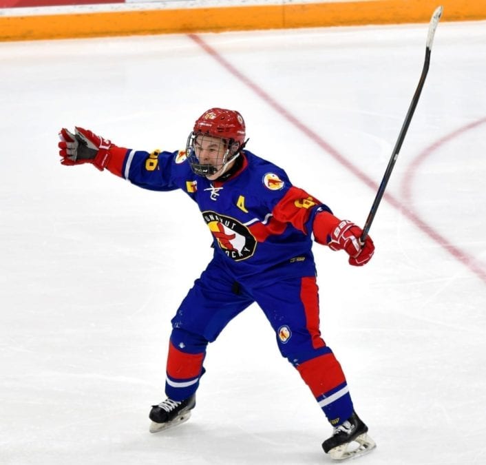 Josie Cote of Iqaluit celebrates after a goal during boys hockey action against Yukon on Feb. 17. Rod Ince/Canada Winter Games photo