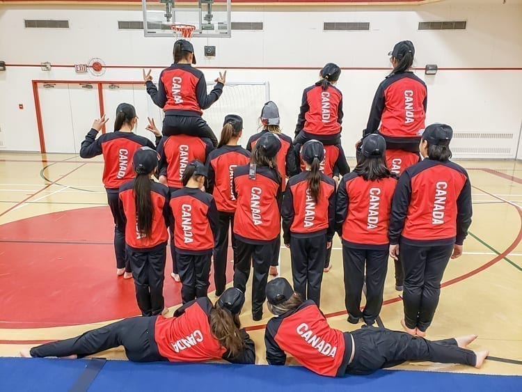 Members of the Rankin Inlet competitive gym team turn their backs to the camera to show what the backs of their new Team Canada uniforms will look like at the upcoming international World Gymnaestrada in Austria from July 7-13. Photo courtesy Lisa Kresky