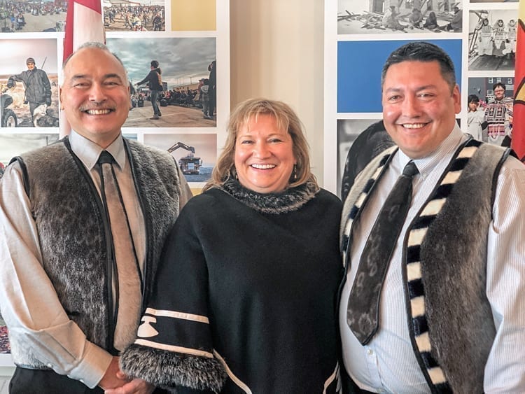 Nunavut Premier Joe Savikataaq, left, and Kivalliq Inuit Association (KIA) president David Ningeongan gladly accept the good news from Parliamentary Secretary to the Minister of Intergovernmental Affairs, Northern Affairs and Internal Trade Yvonne Jones that the KIA was receiving a $1.6 million grant from the Strategic Investments in Northern Economic Development (SINED) program of the Canadian Northern Economic Development Agency (CanNor) to help fund a feasibility study into the Kivalliq Hydro-Fibre Link Project. Photo courtesy KIA
