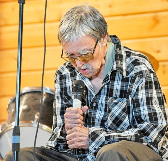 Charlie Panigoniak performs during a benefit concert in his honour in Arviat on Aug. 30, 2016. NNSL file photo