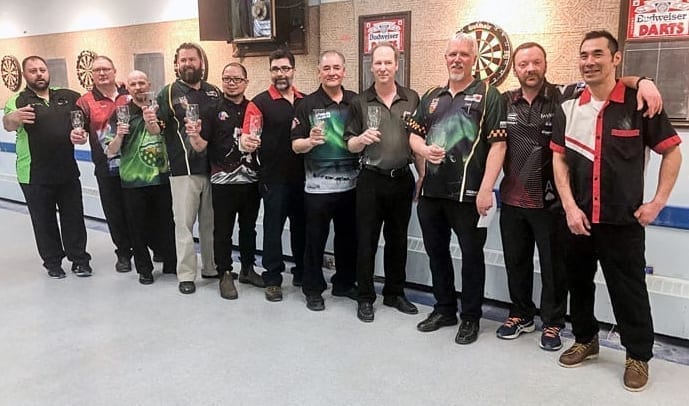 The top men's players from the NWT Darts Championships in Hay River show off their trophies following the completion of the tournament this past Sunday. They are, from left, Keith Way (Yellowknife), Elvis Beaudoin (Yellowknife), Danny Clouston (Yellowknife), Paul Morey (Inuvik), Sheh Murillo (Yellowknife), Joe Laba (Yellowknife), Norm Sanderson (Yellowknife), Tim Griffin (Yellowknife), Dan Kipling (Hay River), Paul Power (Hay River) and Max Kotokak (Inuvik). photo courtesy of Randy Thompson