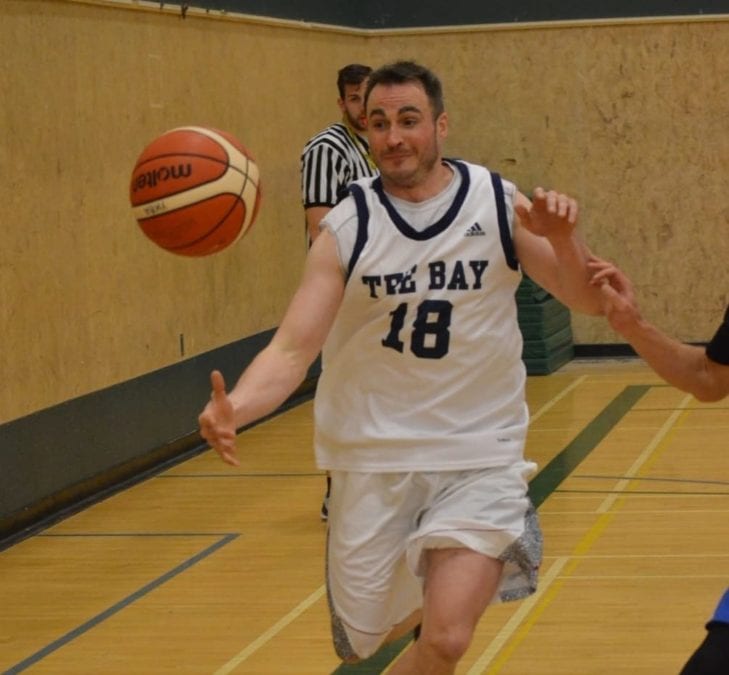 Travis Schindel, playing with The Bay from Cambridge Bay, tries to keep the ball inbounds during the men's final of the Arctic Shoot-Out basketball tournament at St. Pat's Gymnasium on Sunday. James McCarthy/窪蹋勛圖厙 photo